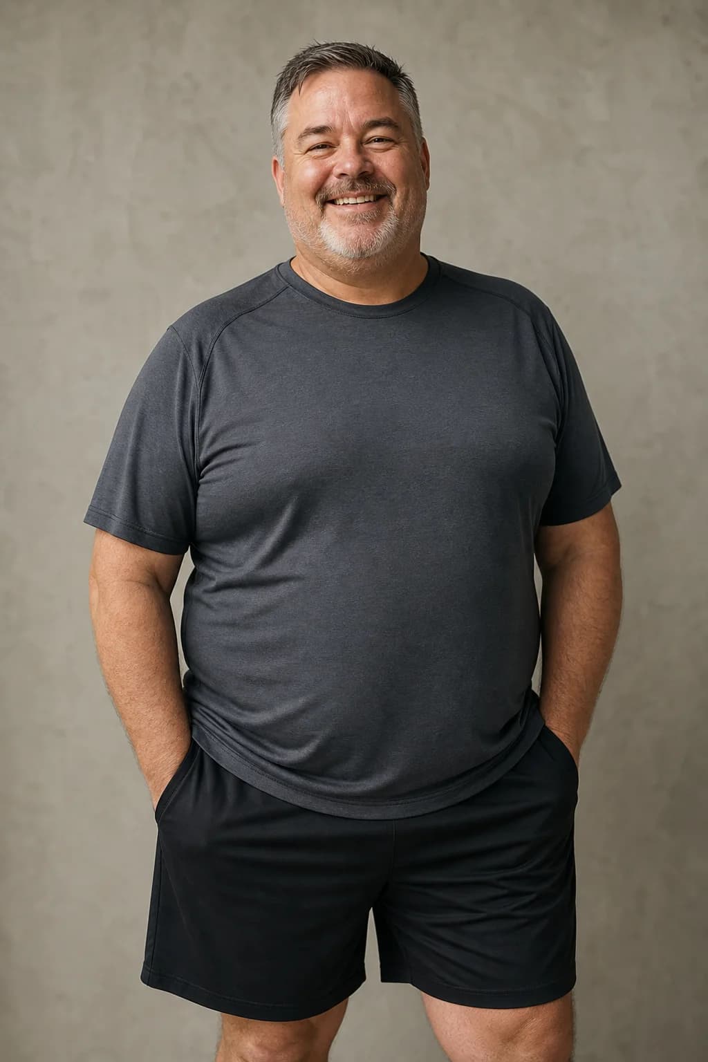 Adult man in charcoal athletic clothing