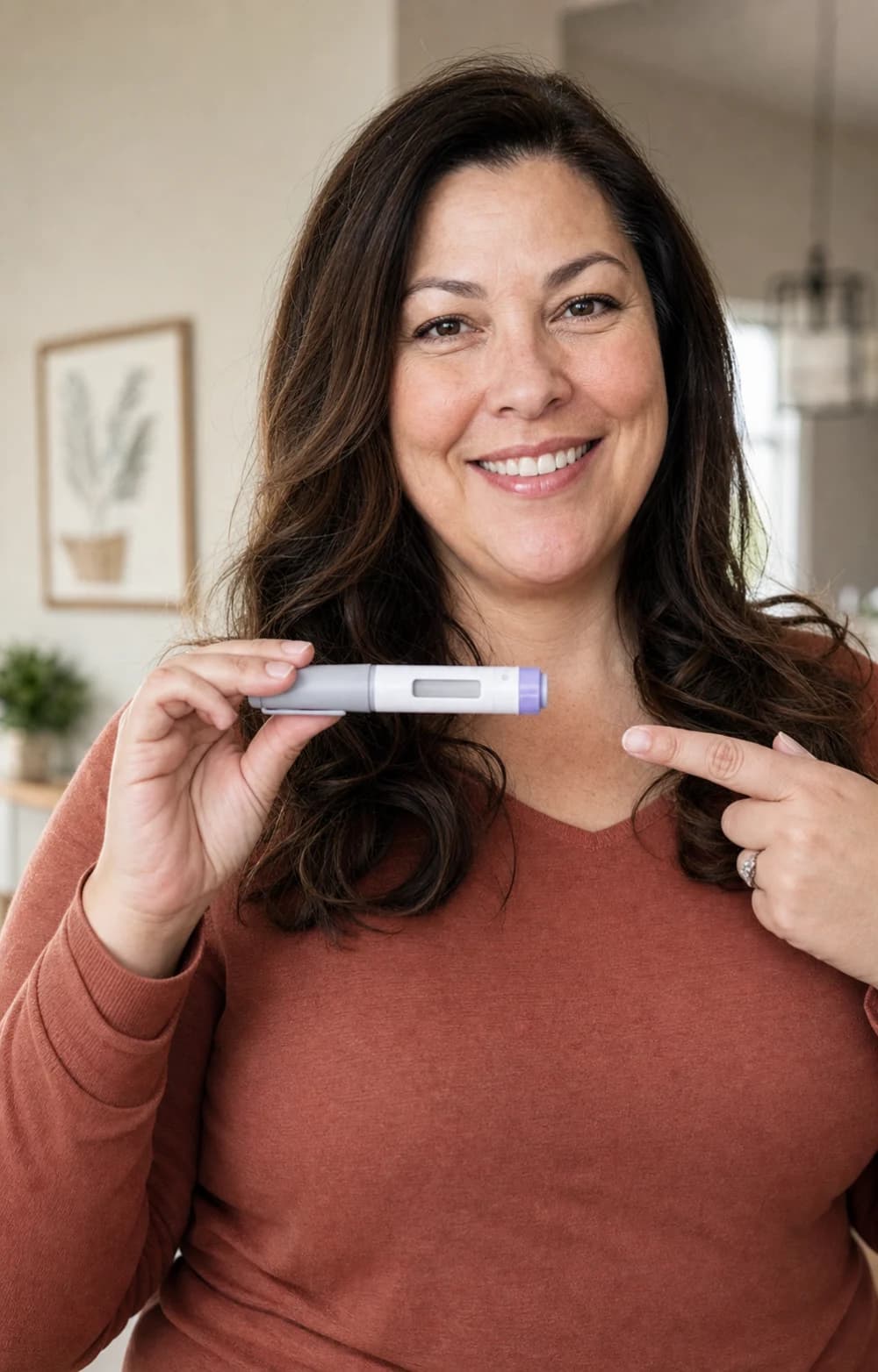 Adult holding an injection pen